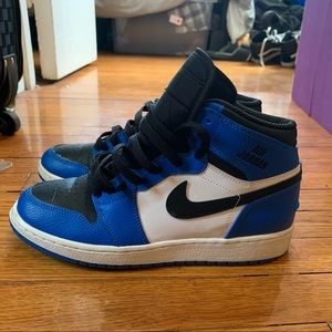 Black and blue Jordan 1s